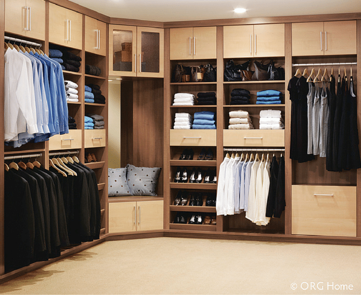 Laminate doors and drawers in a custom closet keep items concealed Innovate Home Org Columbus Ohio
