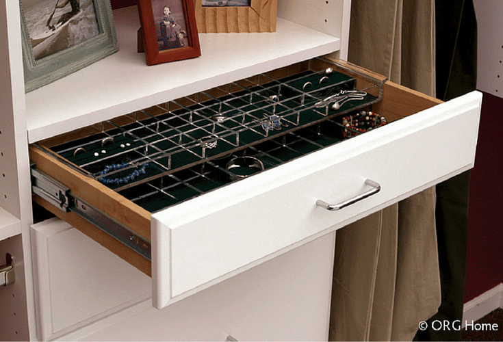 Center drawers in a Columbus Ohio walk in closet design around hanging spaces - Innovate Home Org 