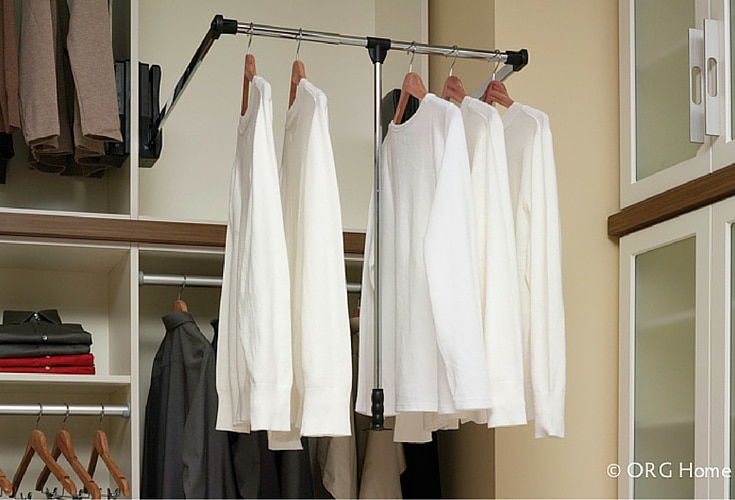 A pull down closet rod is perfect for a universal custom closet design