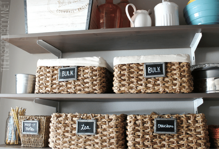 wicker baskets improve storage and orgization in this dublin ohio pantry closet 