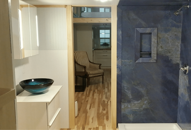 Faux marble wall panels in a luxury tiny home in north carolina 