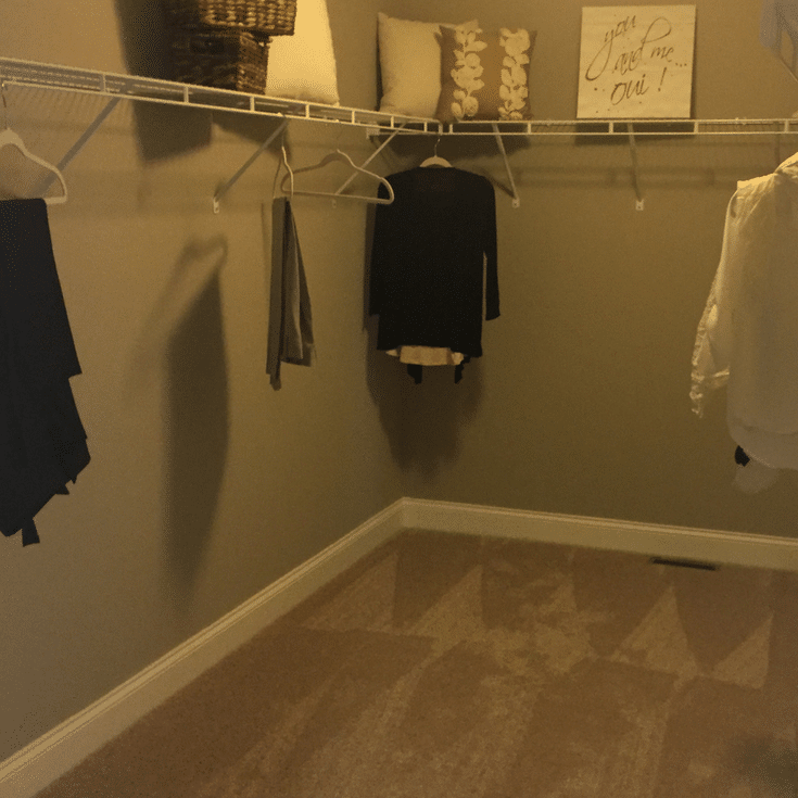 A builders grade low cost closet with wire shelving 