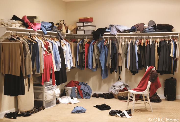 messy closet needing double hang space