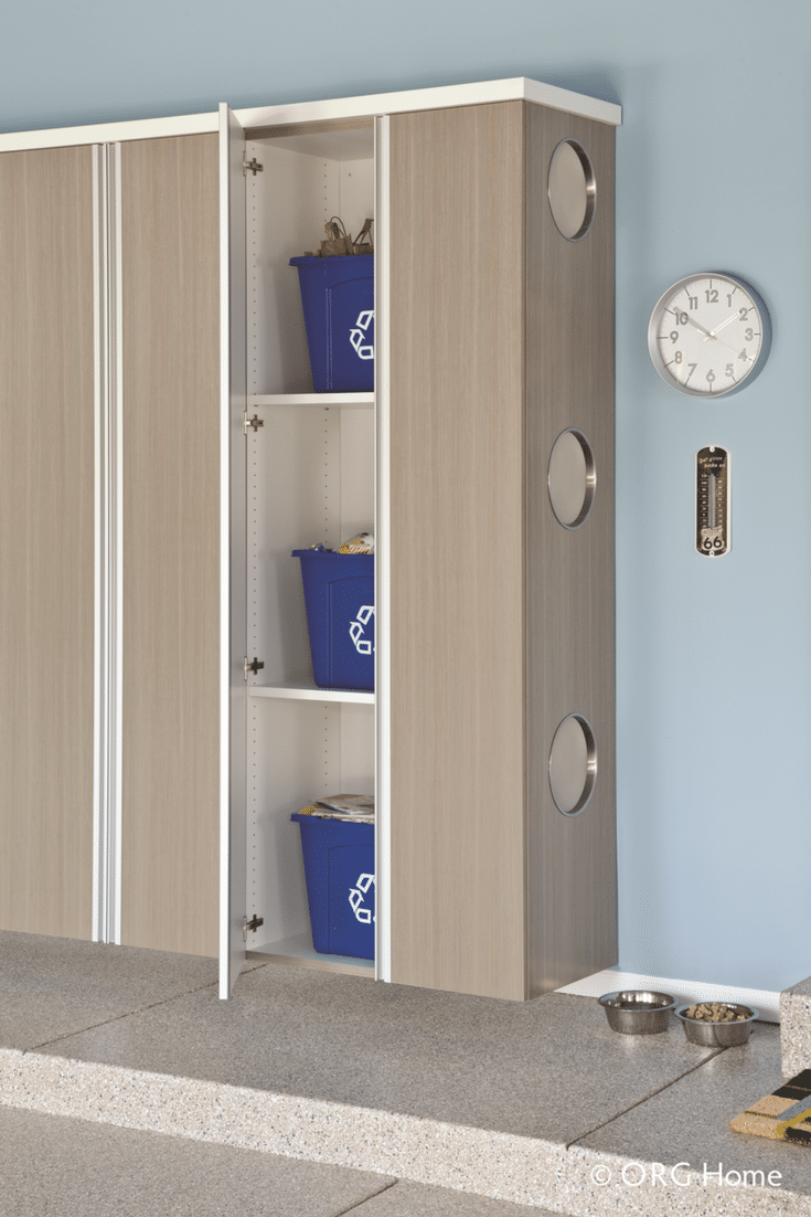 Custom garage cabinetry with recycling doors on the side | Innovate Home Org Columbus Ohio