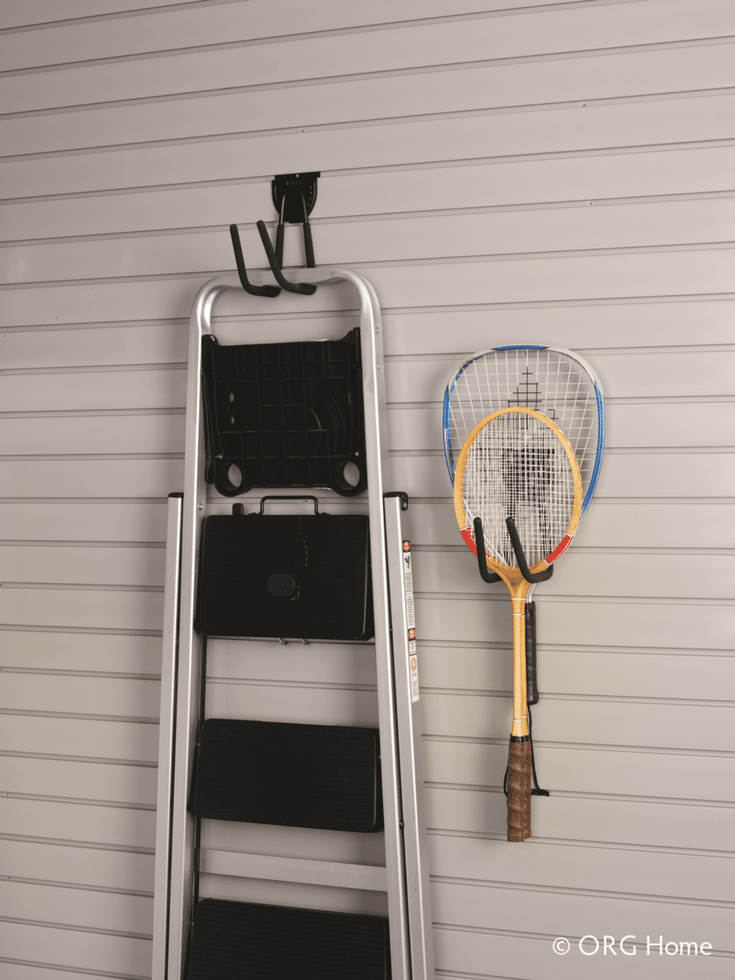 Slat wall garage organizer system to hang up ladders raquets and shovels | Innovate Home Org Columbus Ohio 