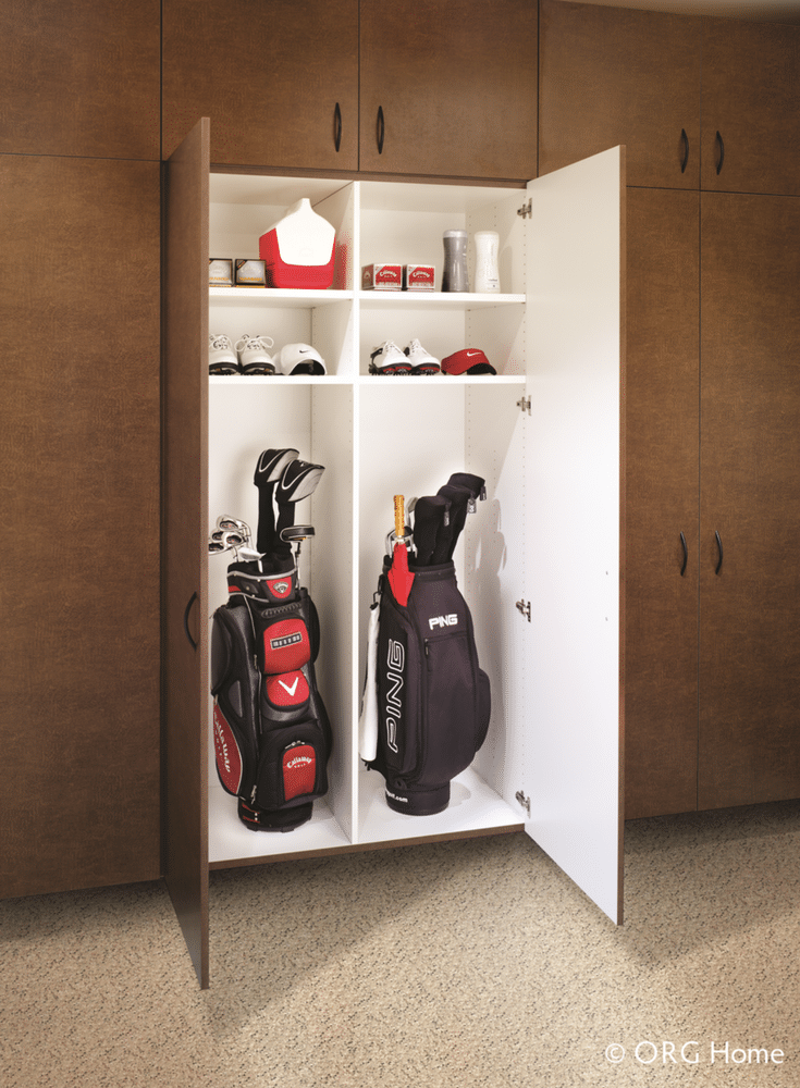Garage cabinetry with double doors hung on a wall for golf club storage in Westerville Ohio | Innovate Home Org Columbus Ohio 