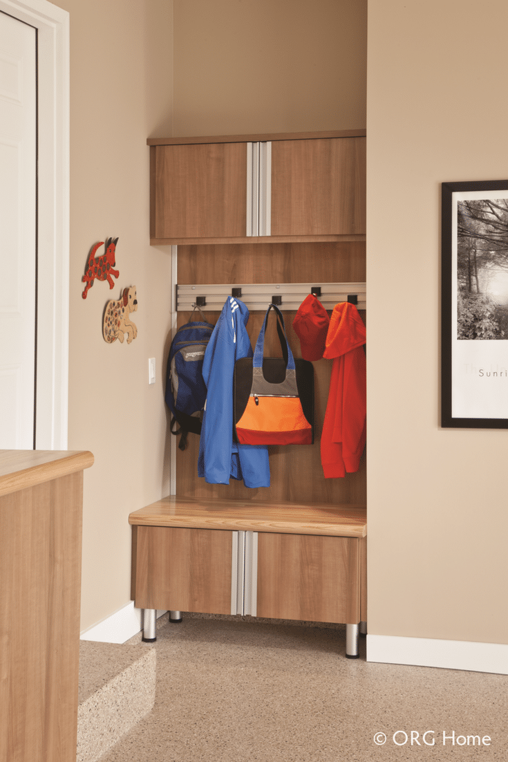 Organized boot storage station in a custom garage system | Innovate Home Org Columbus Ohio 