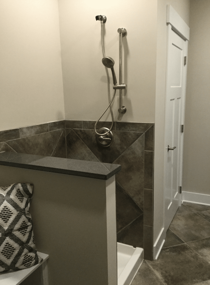 A laundry room dog shower in Columbus BIA Parade of Homes