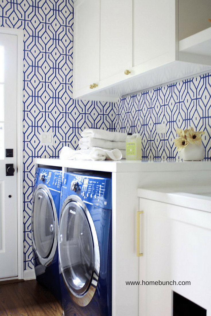 Bold wallpaper in a custom laundry room cabinet design - Innovate Home Org Columbus Ohio 