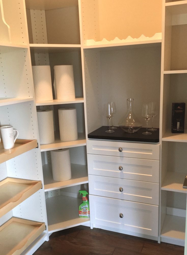 This pantry - in the Columbus BIA 2017 Parade of Homes - has adjustable shelving , pull out scoop style drawers and even a convenient place for cooking trays. | Innovate Home Org Columbus Ohio 