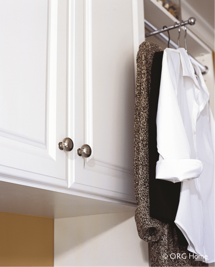 A pull out wardrobe rod for hanging in a laundry room - Innovate Home Org Columbus Ohio