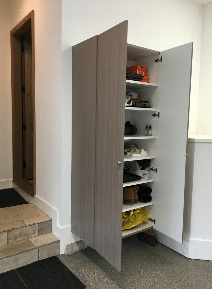 Adjustable shoe shelving in a luxury columbus garage | Innovate Home Org Columbus Ohio 