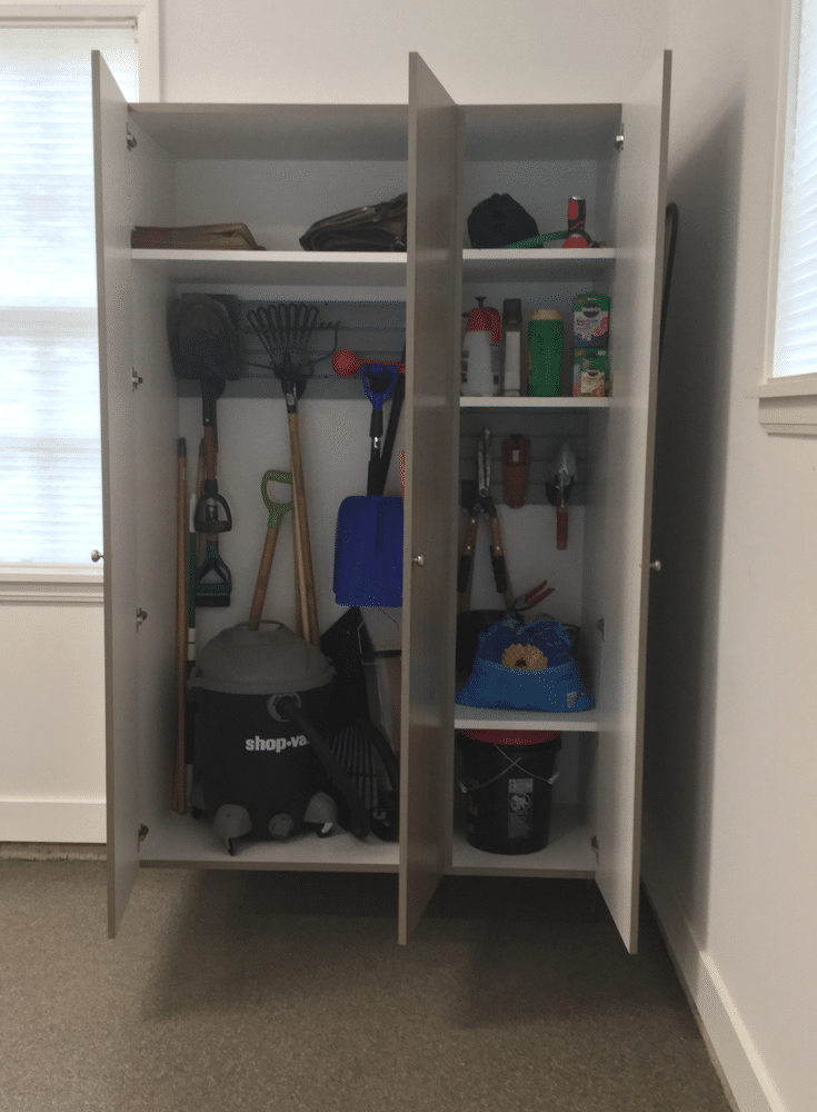 Organization slatwall inside custom garage cabinetry in New Albany suburb of Columbus Ohio | Innovate Home Org