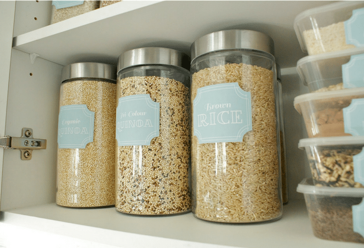 Clear containers for bulk goods in an organized kitchen pantry 