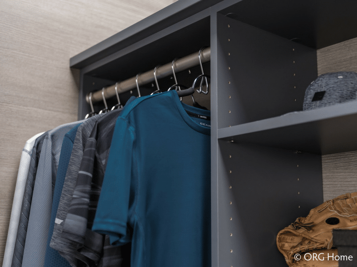 Adjustable closet shelving with holes in support panels so the shelves can be moved up and down | Innovate Home Org Columbus Ohio 