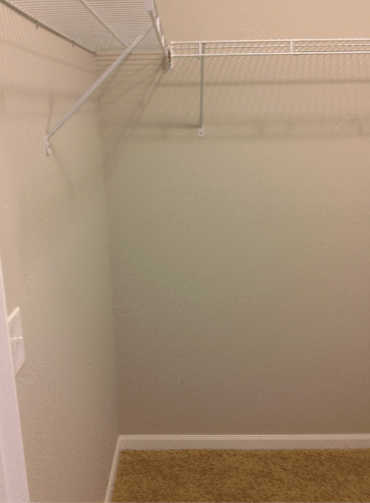 Builders grade closet with a single rod of wire shelving in Columbus Ohio 