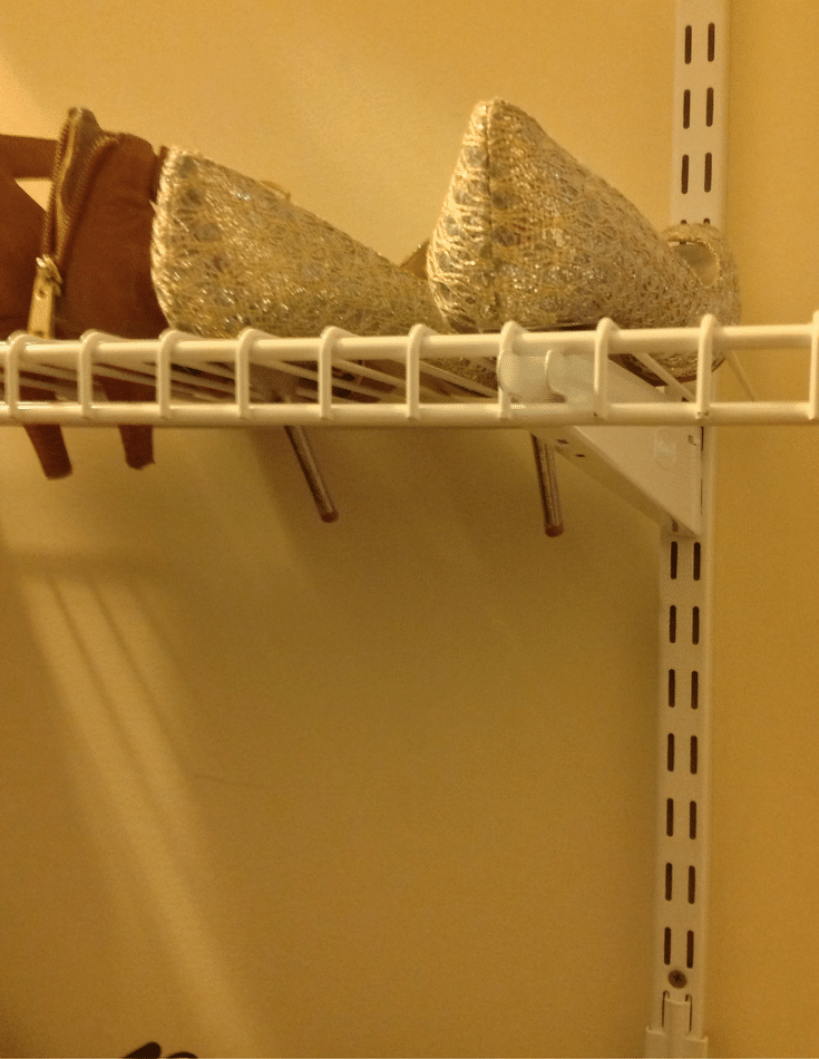 A wire closet installation in Columbus with bad high heel shoe storage 