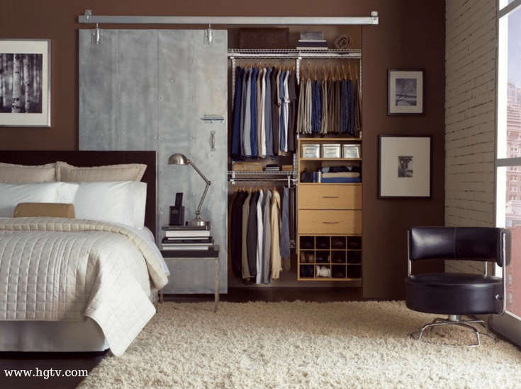 Aluminum sliding barn door in a custom closet to save space @InnovateBuild