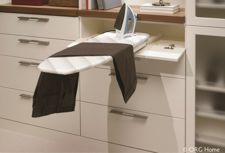 Fold out ironing board for touch ups in a premium Columbus Ohio closet | Innovate Home Org 