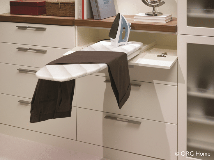 Slide out ironing board inside a custom closet | Innovate Home Org Columbus Ohio 