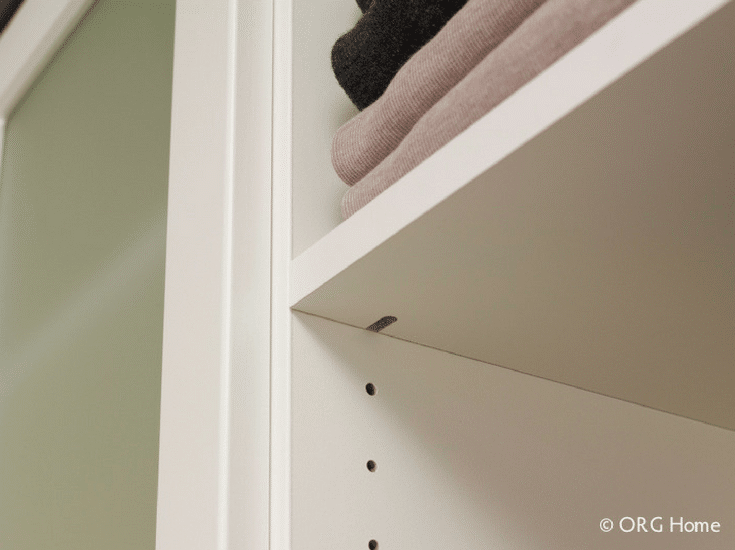 Adjustable closet shelving organizer system in a white laminate in a Worthington Ohio closet - Innovate Home Org 