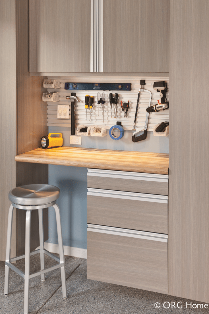 Garage storage workbench with a butcher block countertop and hanging cabinets in Westerville Ohio - Innovate Home Org Columbus Ohio 