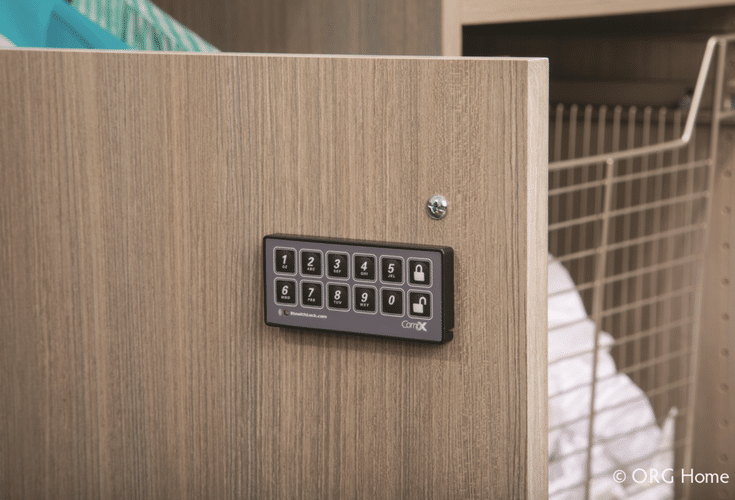 Safety lock on a laundry room storage cabinet door - Innovate Home Org Columbus Ohio 