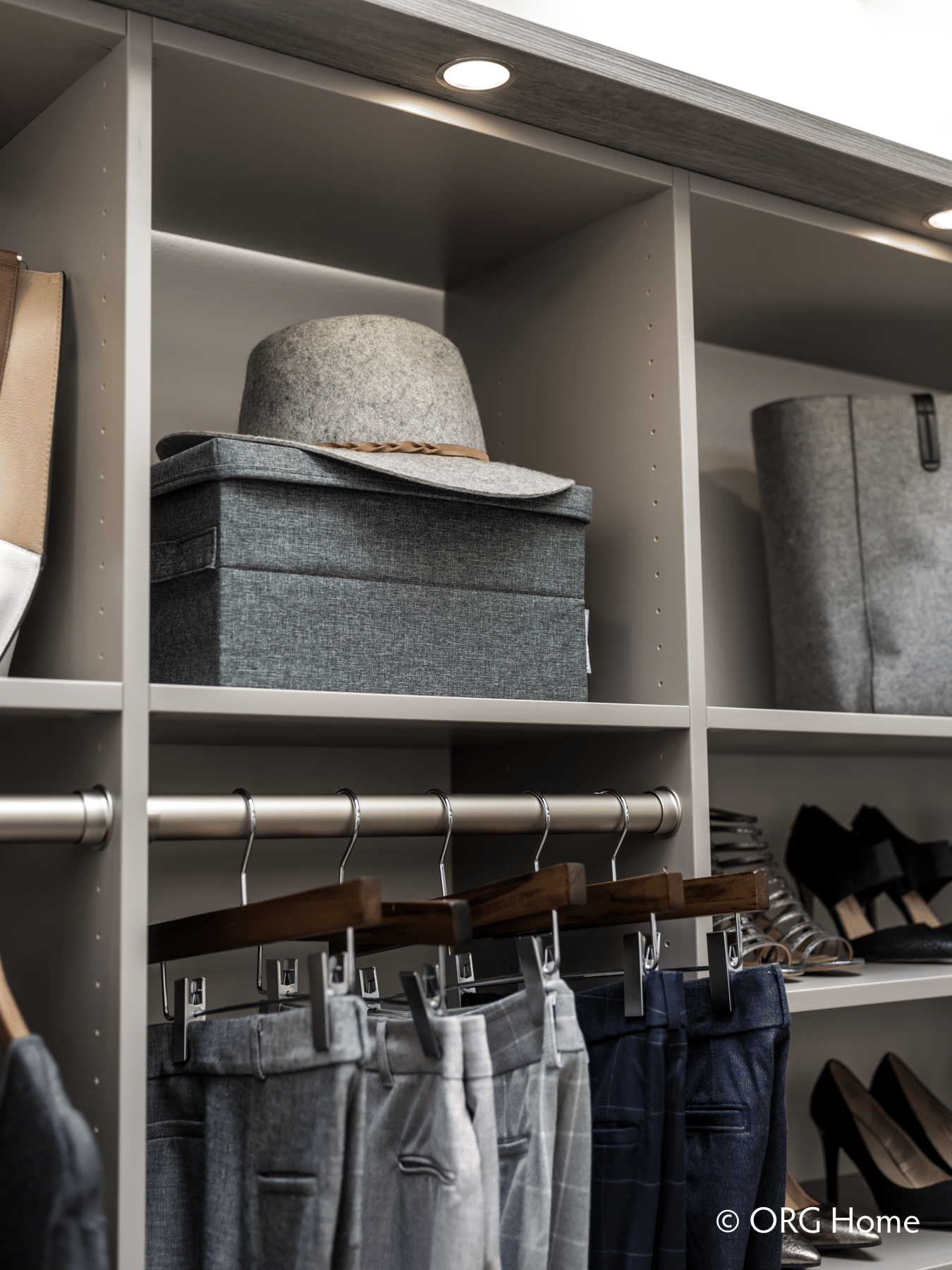 LED puck lighting built into the top closet shelf in Columbus Ohio - Innovate Home Org