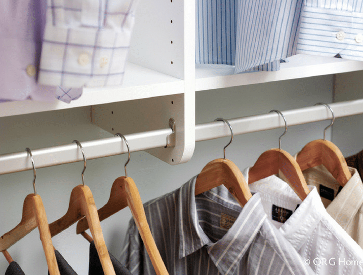 Walk In Closet With White Laminate Sections | Innovate Home Org | #UpperArlington #WhiteLaminate #WhiteCloset #HangingSystem