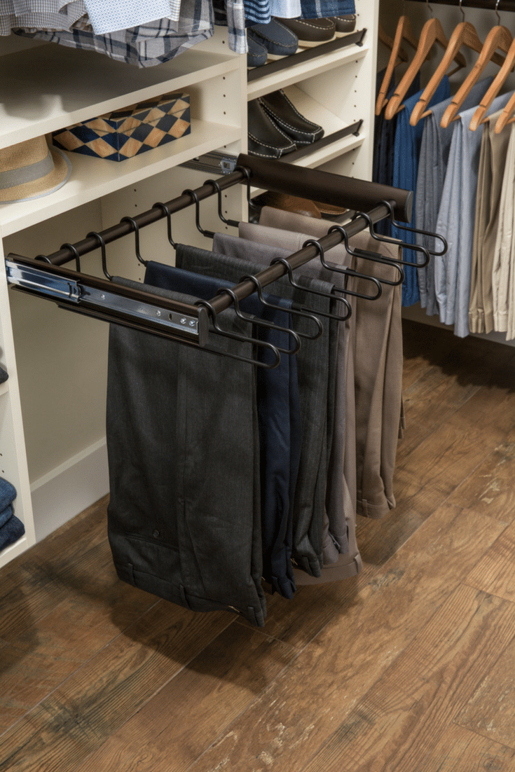 Pull out pants rack in a Columbus Ohio closet | Innovate Home Org | #PantsRack #ColumbusCloset #ClothesStorage #HangingOrganizer