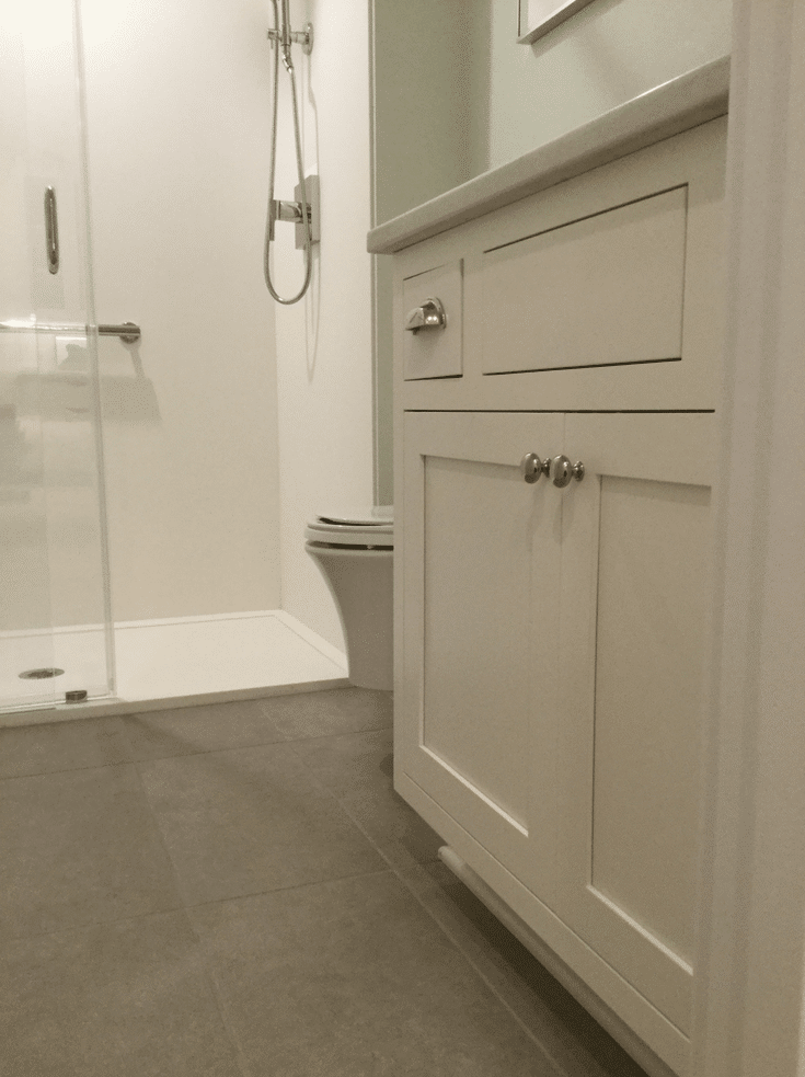 Guest bathroom solid surface shower Panels | Innovate Home Org | Innovate Building Solutions | #ShowerPanels #SolidSurfacePanels #GroutFreePanels