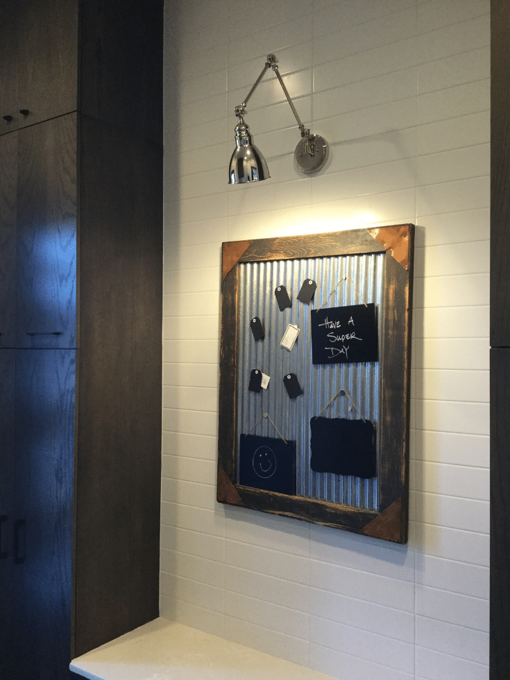 Galvanized metal board for a family planning center in a columbus mudroom | Innovate Home Org | #MudroomStorage #BullentinBoard #MudroomAccessories