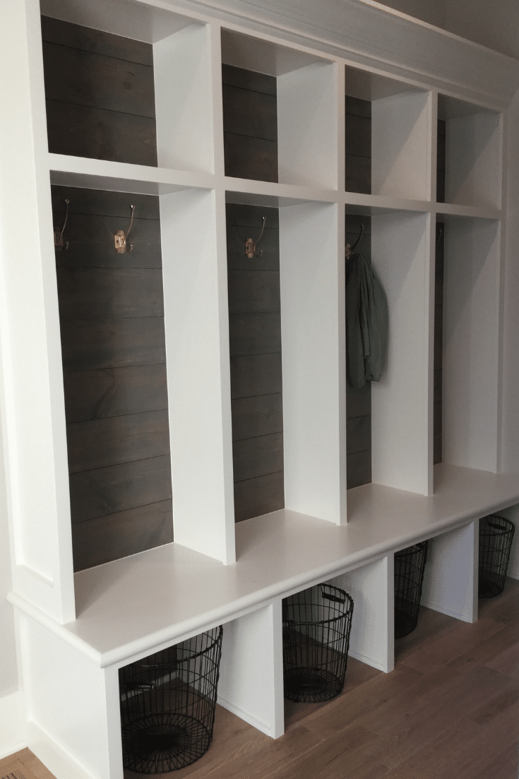 Gray wood feature wall in open cubby mudroom Memmer Homes | Innovate Home Org | #OpenCubby #MudroomStorage #FeatureWall