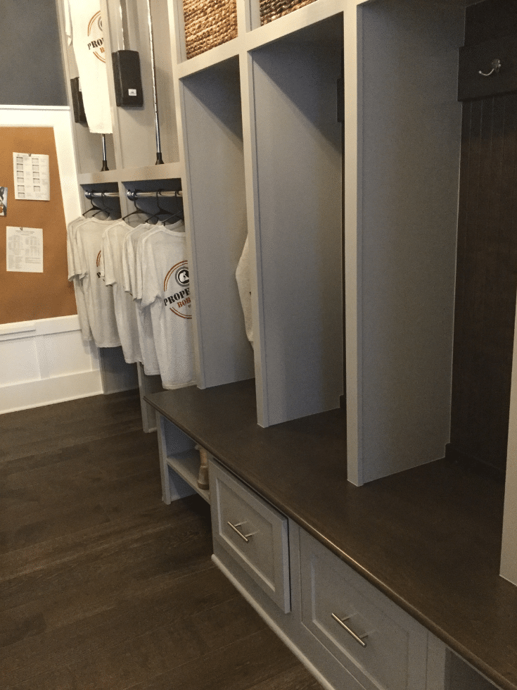 Pull out drawers in Bob Webb mudroom cabinetry | Innovate Home Org | #MudroomCabinetry #MudroomStorage #EntryWayStorage