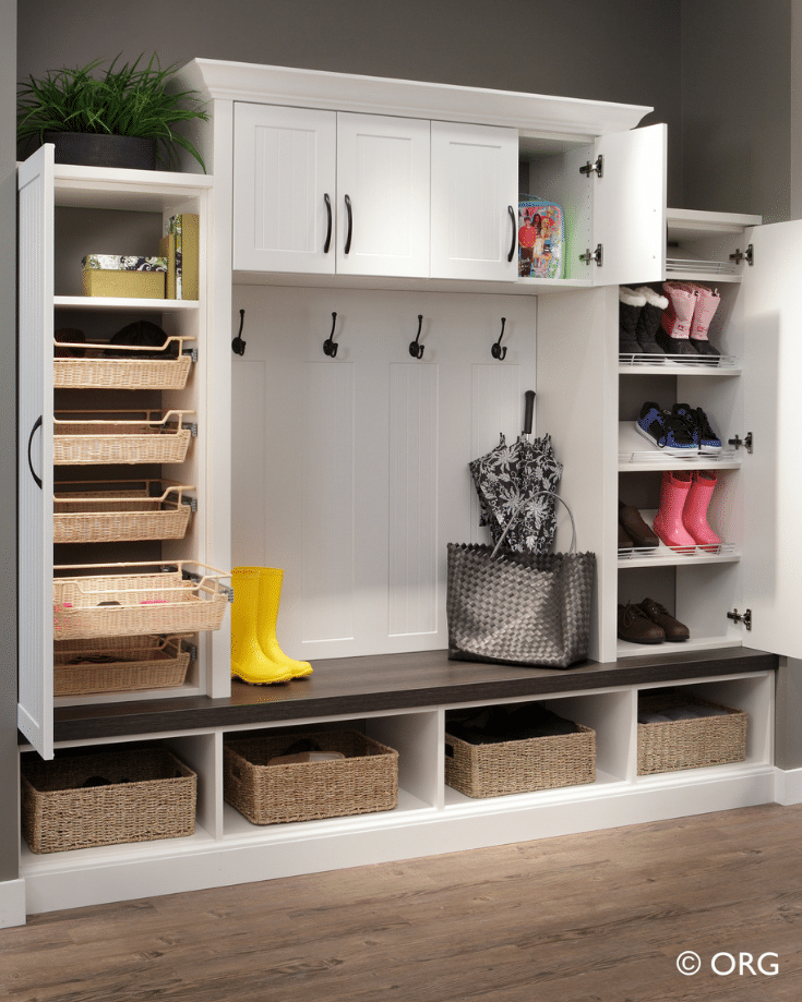 A laminate closet designed to withstand wet boots and clothes | Innovate Home Org | Upper Arlington, Oh | #ClosetCubbies #EntrywayDesigns #MudroomIdeas #OrganizationIdeas