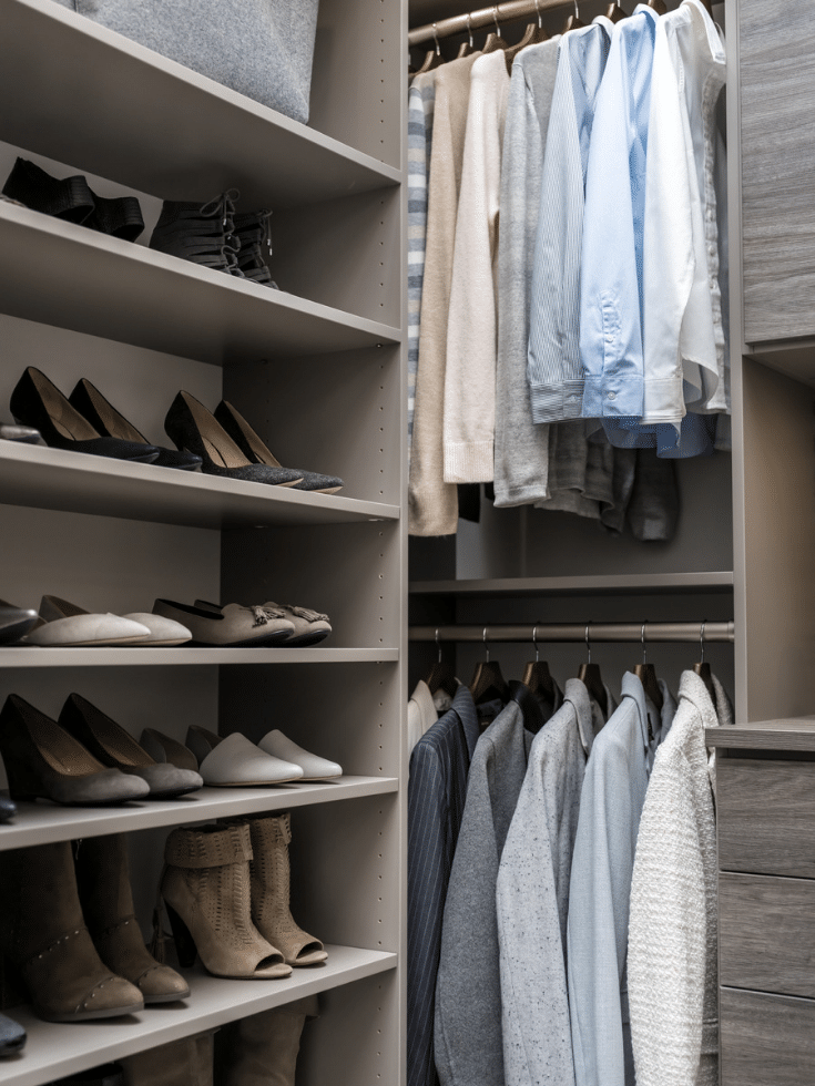 Flat shoe shelves in a Columbus closet | Innovate Home Org | #ShoeShelves #CustomCloset #HangingStorage #ShoeRacks