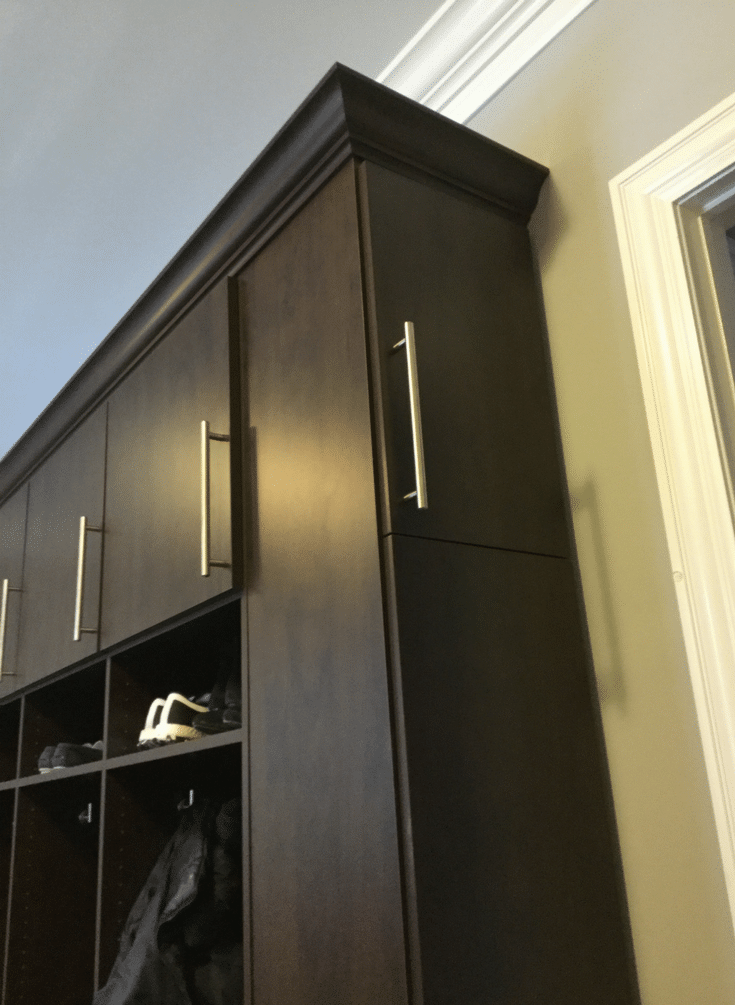 Mocha colored laminate mudroom storage system in Dublin Ohio | Innovate Home Org | Columbus OH | #HomeOrganization #OrganizationSystem #StorageSystem