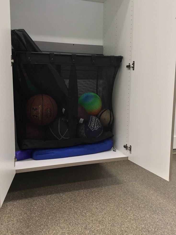 Garage storage mesh basket for balls in New Albany Ohio garage | Innovate Home Org | #GarageStorage #Meshbasket #NewAlbanyGarage