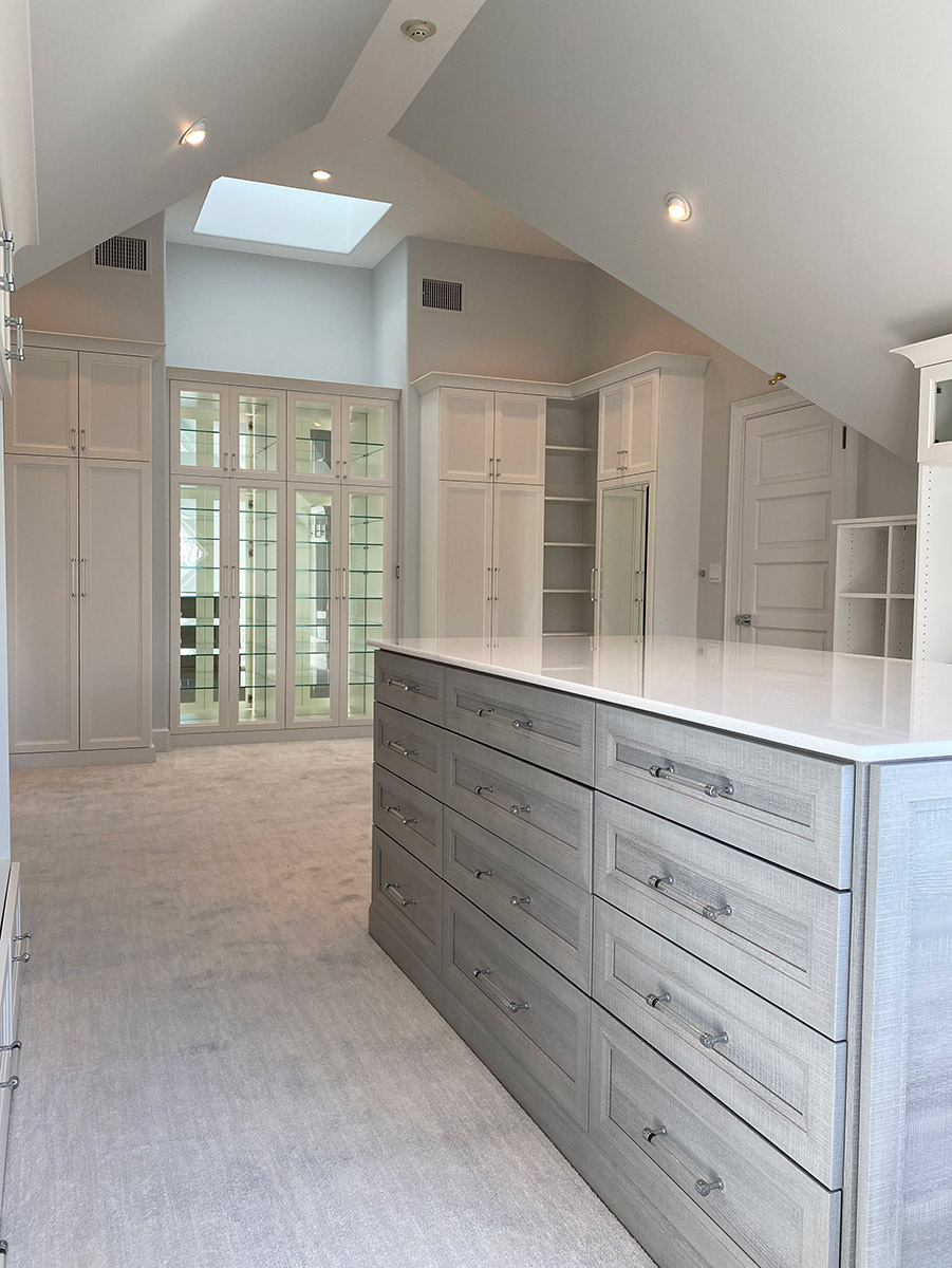 ceiling height in a custom closet credit Boutique Closets and Cabinetry | Innovate Home Org | Columbus, OH #CustomStorage #HighCeilings #CustomClosets