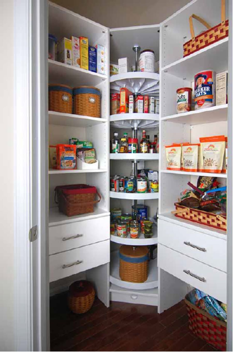 Custom lazy susan in a kitchen pantry credit Closet America.com | Innovate Home Org | #StorageSystems #OrganizationStorage #KitchenPantry #ClosetStorage