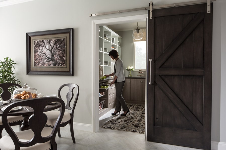 barn door into a columbus kitchen pantry shelving storage system | Innovate Home Org | #PantryStorage #OrganizationStorage #KitchenPantry