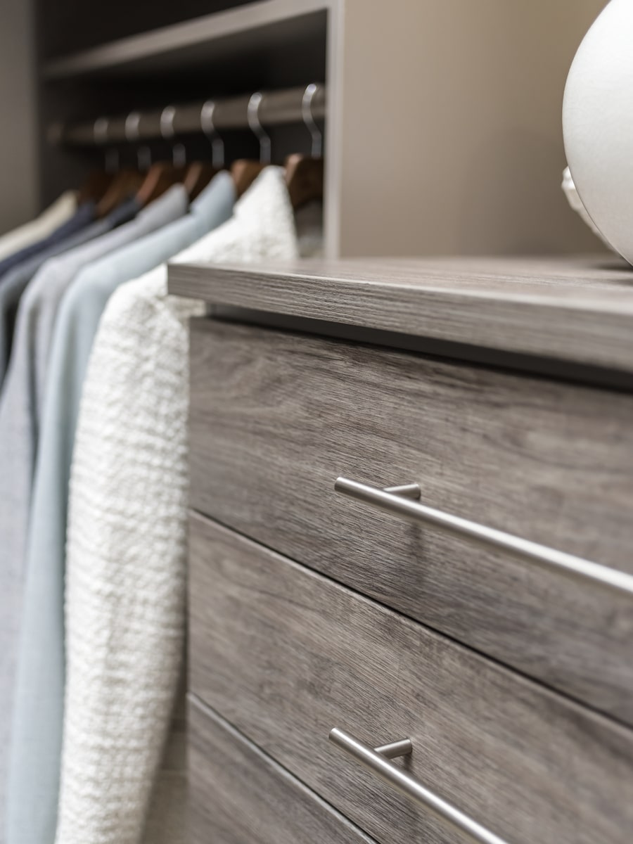 https://innovatehomeorg.com/wp-content/uploads/2020/08/close-up-laminate-drawer-front-in-a-closet-Columbus-ohio.jpg