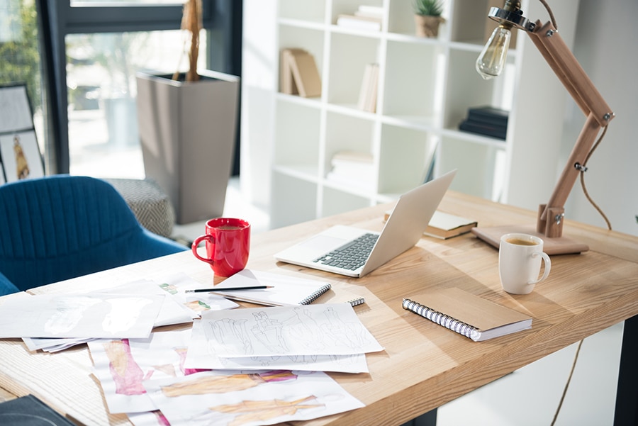 messy papers on a desk is bad for small workspaces | Innovate Building Solutions | Innovate Home Org | #MessyWork #WorkSpace #homeoffice