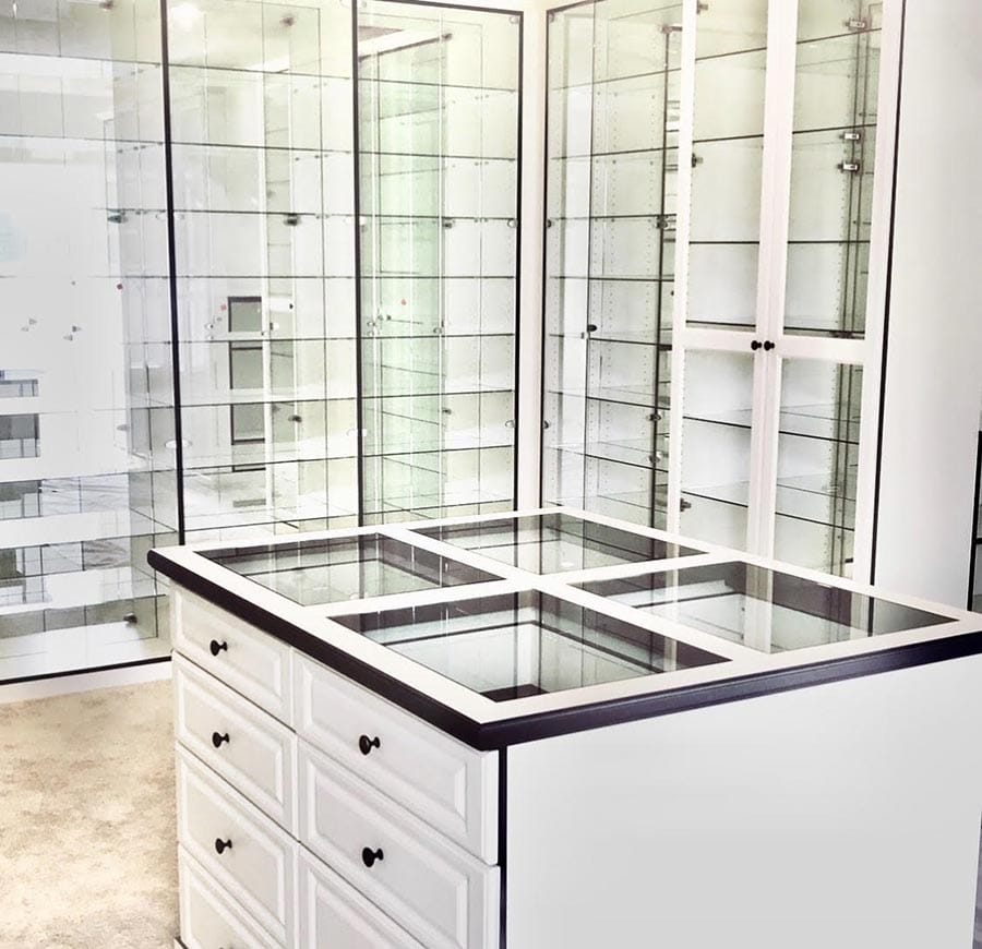 Idea 16 glass shelves in a custom closet and island credit Beth Patrick Closet Factory Cleveland | Innovate Home Org | #GlassShelves #StorageShelves #Organization #BeautifulClosets