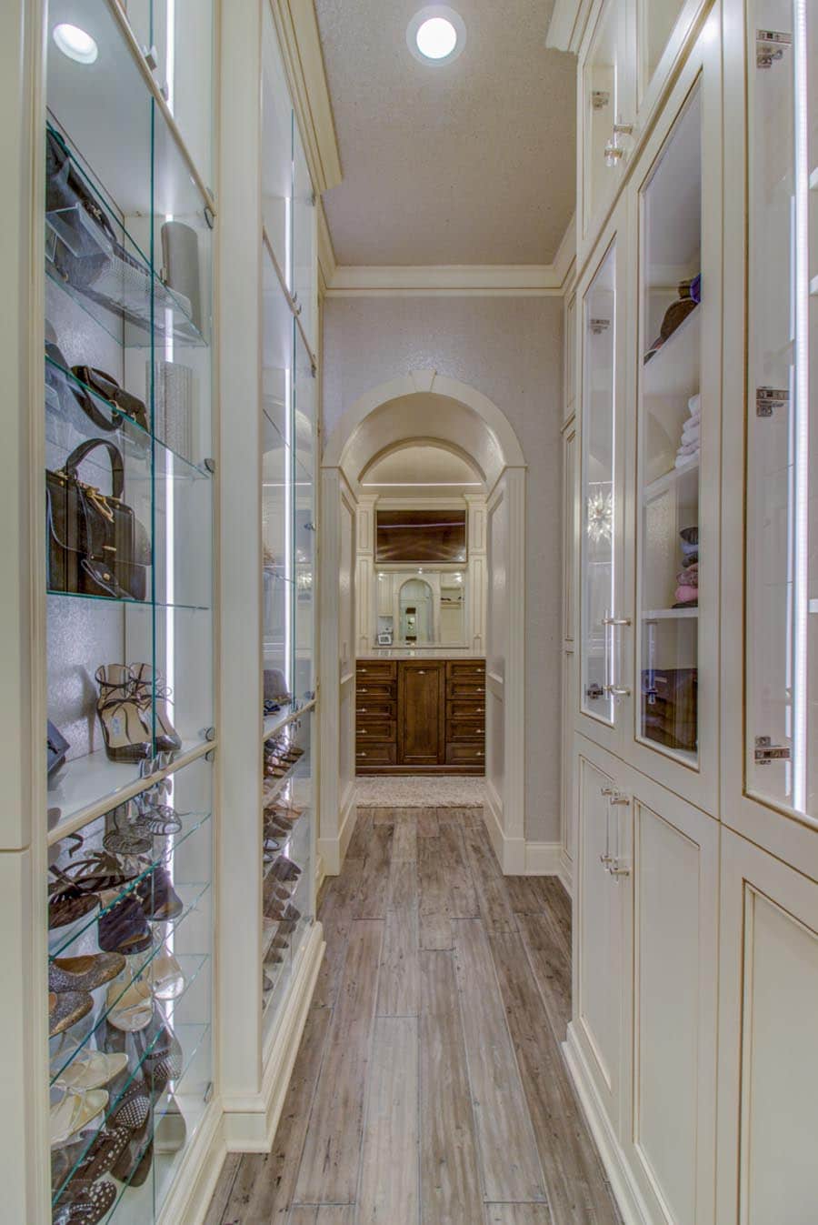 Idea 9 lighting in a luxury high end closet credit Beth Patrick Closet Factory Cleveland | Innovate Home Org  | #customstorage #OrganizationSystems #StorageSolutions