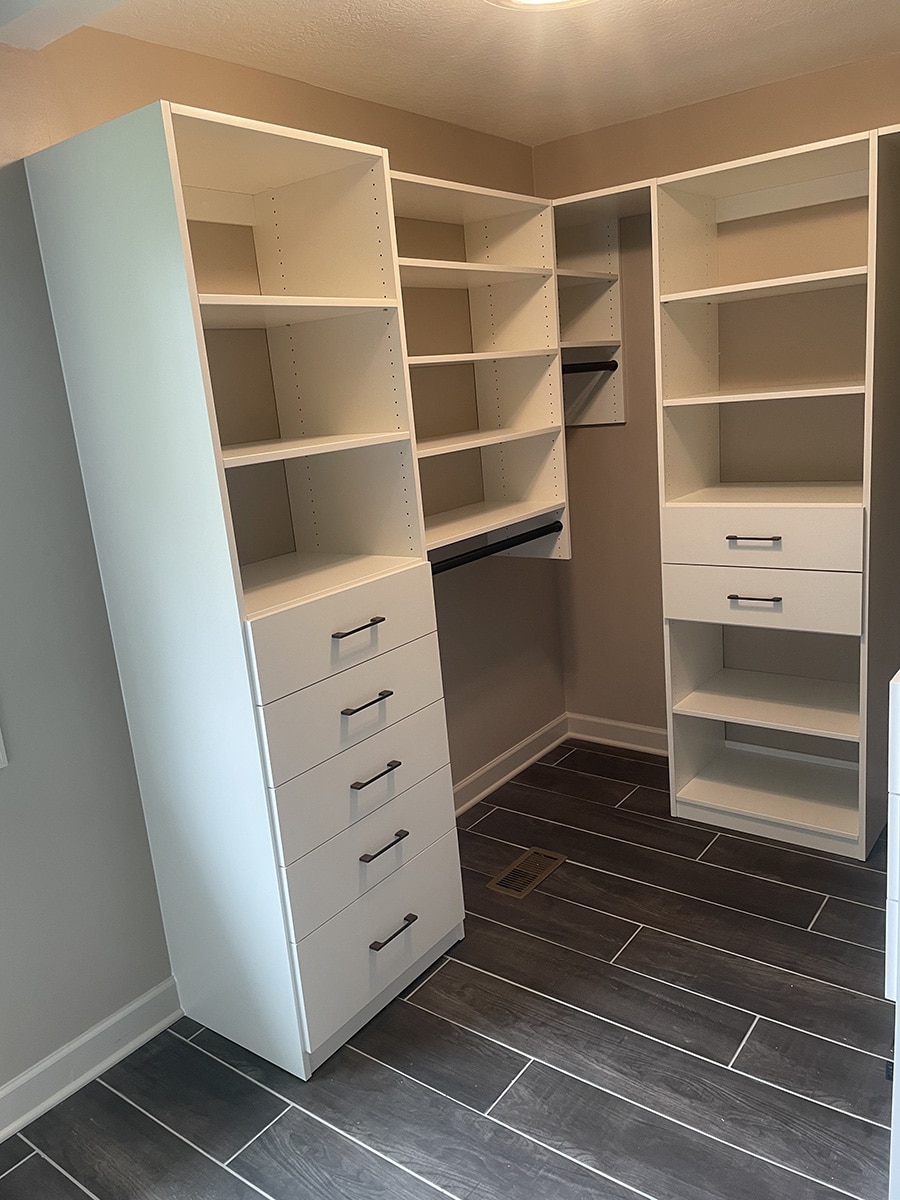 Con 1 - painted walls in a small custom closet Custom Closet Jim Parker | Innovate Home Org  #CustomStorage #Organization  #Storagesystem #Paintedwalls #WalkIncloset