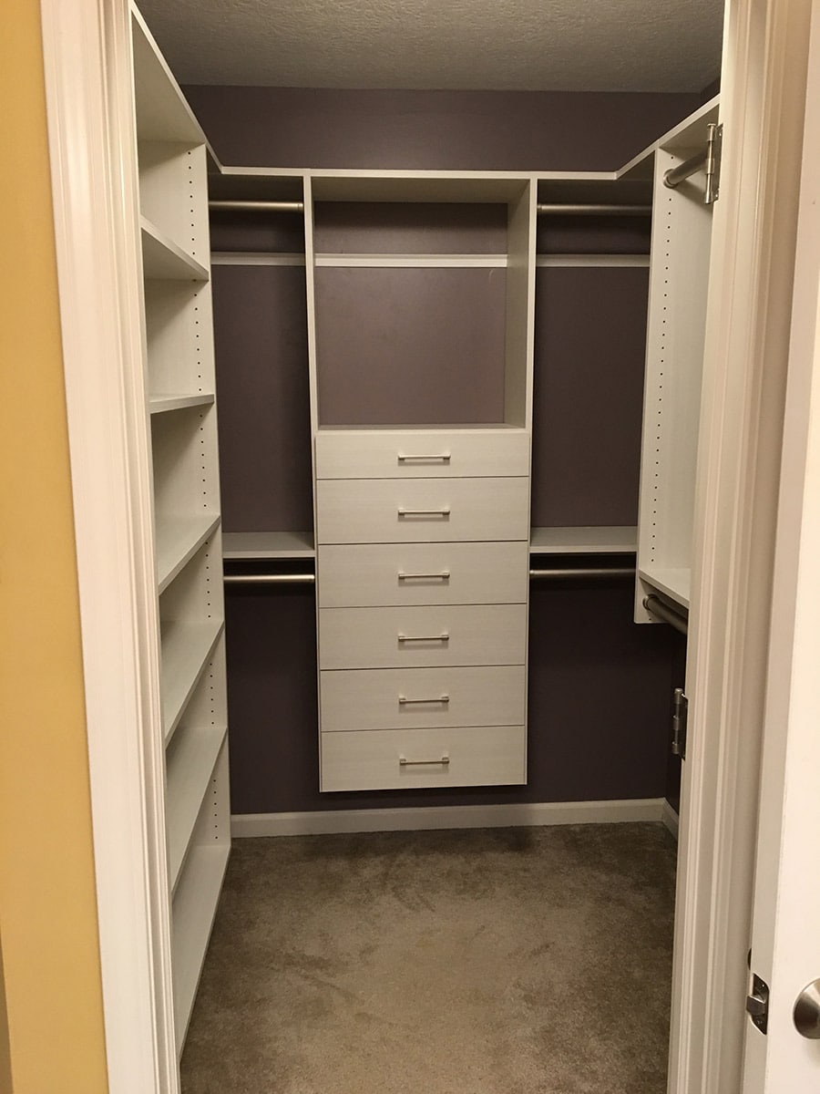 Tip 6 closet drawers in a small walk in closet Westerville Columbus Ohio | Innovate Home Org #CustomStorage #ClosetDrawers #WallHungCloset