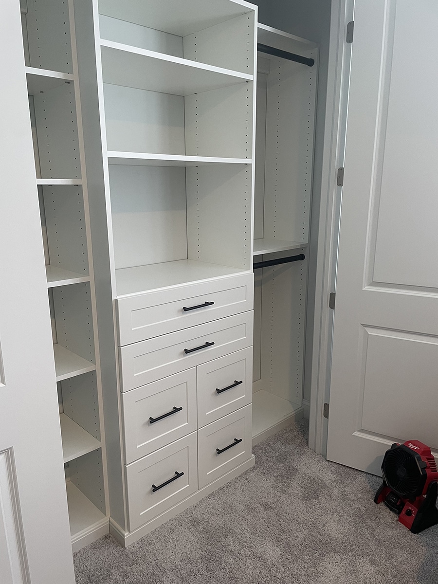 Question 9 type 2 floor based closet in Pickerington Ohio white shaker matte black handles | Innovate Home Org #WalkInCloset #Floorbasedsystem #StorageSystems #Drawers #Builtindresser