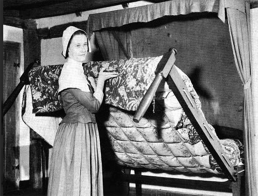 Fact 11 - old picture of a woman folding up a murphy bed credit www.smartspaces.com | Innovate Home Org #MurphyBed #FoldUpBed #StudioApartment
