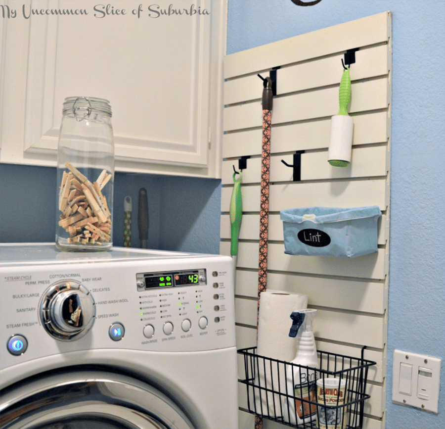 problem 5 slatwall in a laundry room for brooms and supplies credit www.myuncommonsliceofsuburbia.com  | Innovate Home Org #Slatwall #LaundryRoom #laundryshelvingunit